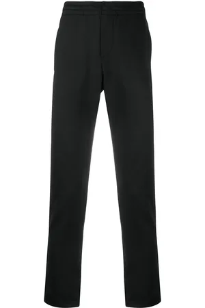 VALENTINO GARAVANI Logo-print slim track pants