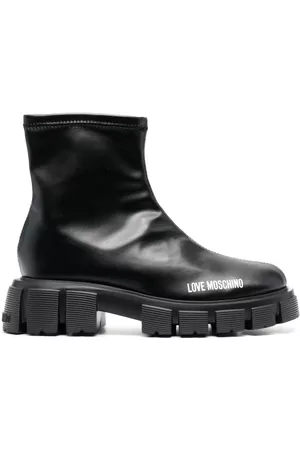 Moschino 50mm logo-print studded sole boots