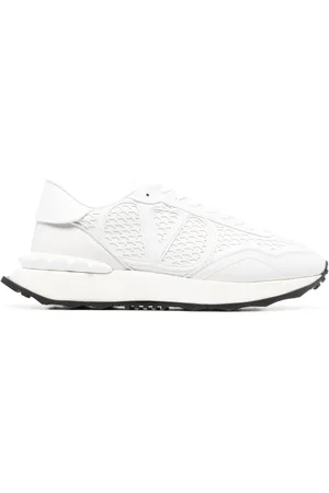 VALENTINO GARAVANI Logo-embossed sneakers