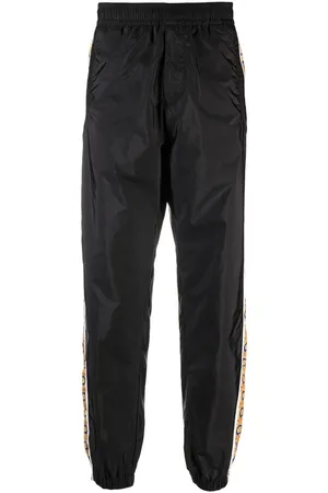 VERSACE Graphic-stripe taffeta track pants