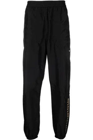 VERSACE La Greca print track pants