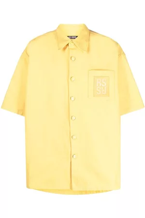 RAF SIMONS Logo-patch denim short-sleeved shirt