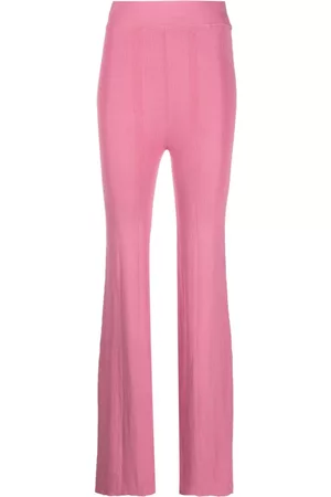 REMAIN Ribbed knit flared trousers