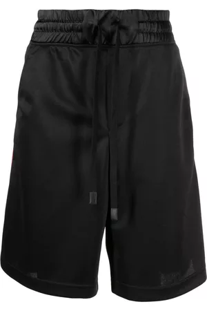VERSACE Debossed-logo shorts
