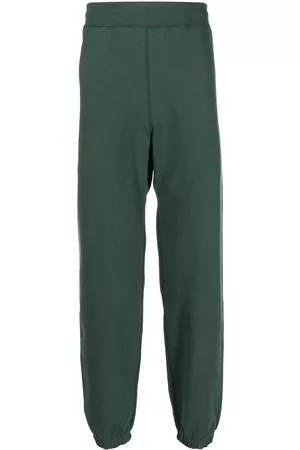 SUICOKE Logo-print cotton track pants