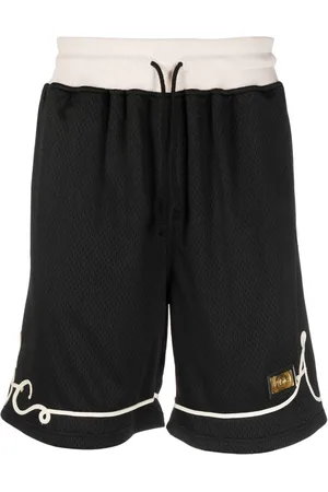 ADVISORY BOARD CRYSTALS Logo-appliqué track shorts