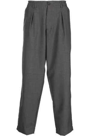 Universal Works Men Pants - Pleat-detail tapered trousers