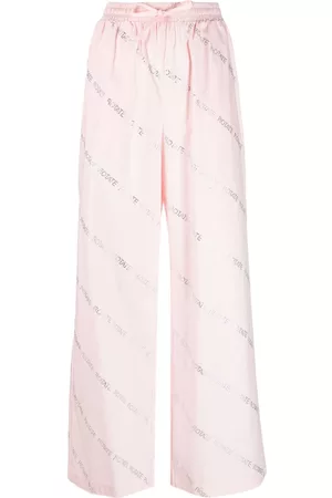 ROTATE Logo-pattern cotton trousers