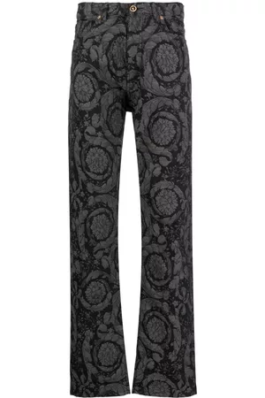 VERSACE Barocco Silhouette patterned jeans