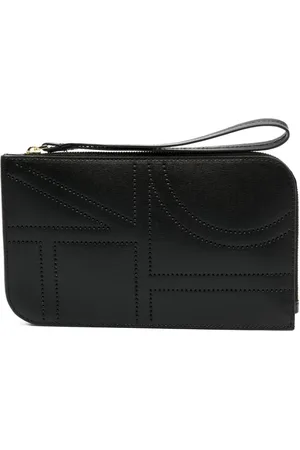 Totême Perforated monogram clutch