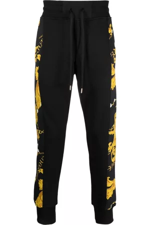 VERSACE Baroque-pattern print panel trousers