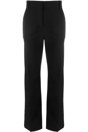 VALENTINO GARAVANI Rockstud-embellished tailored trousers