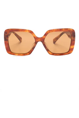 Miu Miu Tortoiseshell logo-arm sunglasses