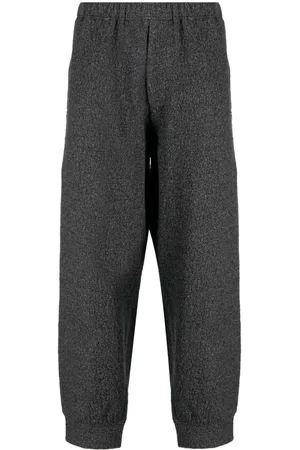 YOHJI YAMAMOTO Crinkled mélange-effect trousers