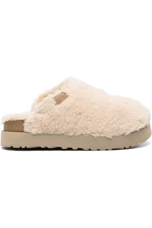 Loungeable faux fur lined PU mule slipper in black and cream