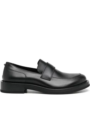VALENTINO GARAVANI Logo-debossed leather loafers