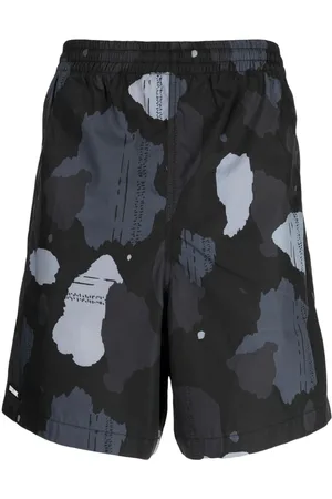 Izzue Graphic-print cotton track shorts