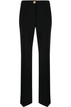 Moschino Pressed-crease button-fastening tailored trousers