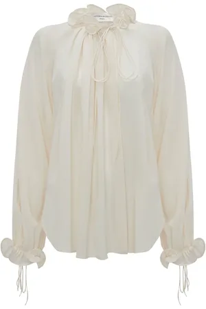 Victoria Beckham Ruffle-trim pleated silk blouse