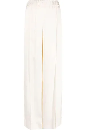 Jil Sander Pressed-crease elasticated-waist flared trousers