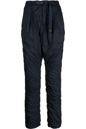 UNDERCOVER Logo-tag buckle-fastening tapered trousers