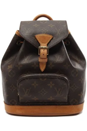 Louis Vuitton 2019 pre-owned Monogram Palm Spring PM Backpack - Farfetch in  2023