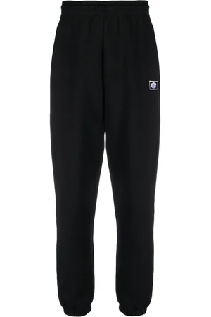 ROTATE Logo-embroidered organic cotton track pants