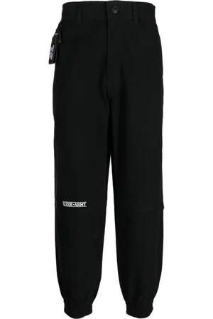 Izzue Logo-print tapered-leg trousers