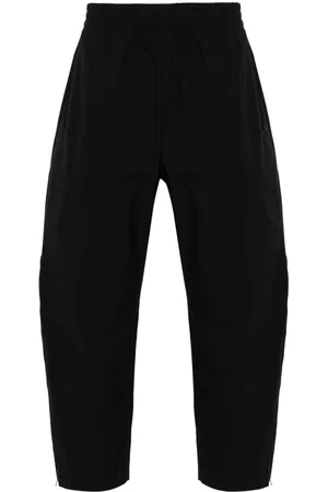 STUDIO NICHOLSON Opal tapered-leg trousers