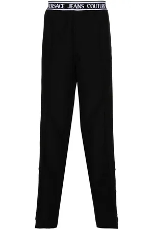 VERSACE Logo-waistband straight-leg trousers