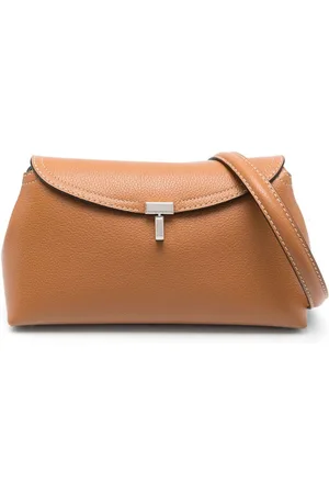 Totême T-Lock leather clutch bag