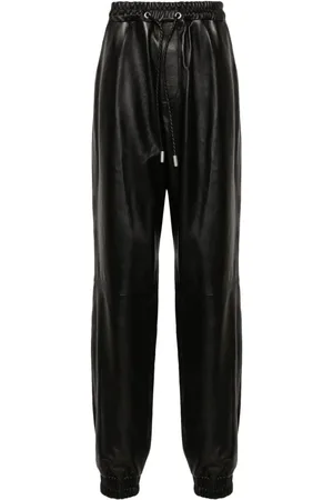 OFF-WHITE Leather track pants