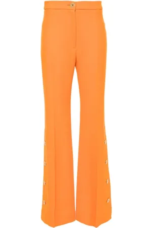 Patou Button-hem flared wool trousers