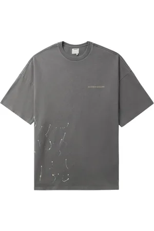 Musium Div. Paint-splatter logo-print cotton T-shirt