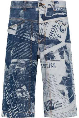 VERSACE Newspaper-print denim shorts