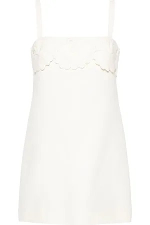 VALENTINO GARAVANI Floral-appliqué crepe mini dress