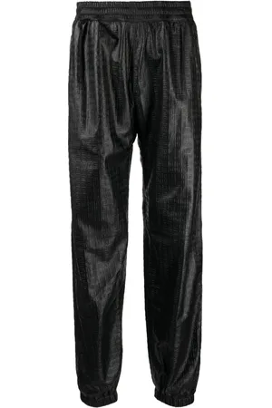 Givenchy Embossed-4G pattern leather trousers