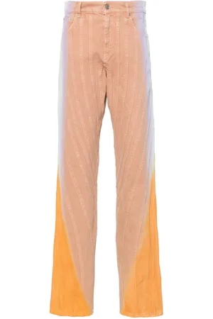 MUGLER Gradient-effect spiral baggy jeans