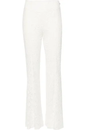 ROTATE Floral-lace flared trousers