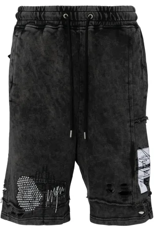 Musium Div. Distressed cotton track shorts