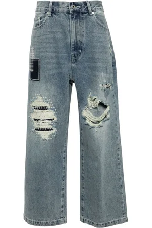 Musium Div. Distressed wide-leg cotton jeans