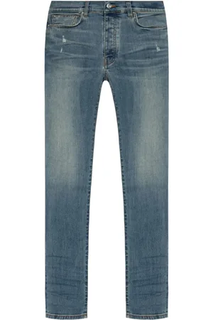 AMIRI Stack low-rise skinny jeans