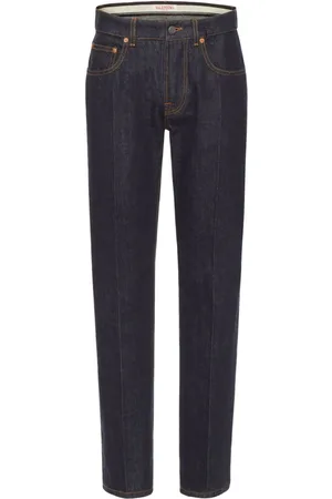VALENTINO GARAVANI Logo-appliqué tapered-leg jeans