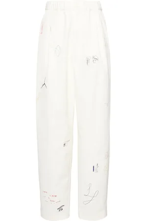 UNDERCOVER Sketch-style printed trousers