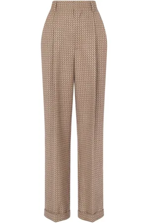 Moschino Geometric-print virgin-wool trousers