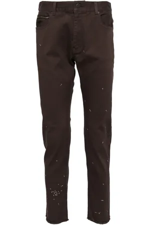 UNDERCOVER Embroidered design jeans