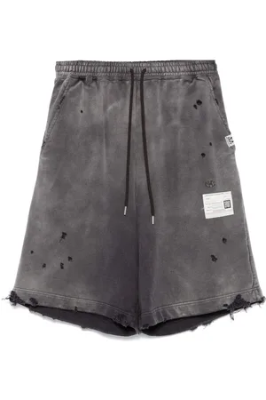 Maison Mihara Yasuhiro Distressed track shorts