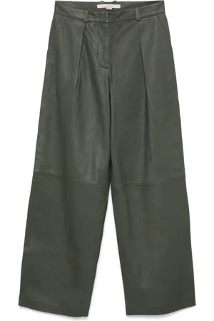 REMAIN Tapered leather trousers