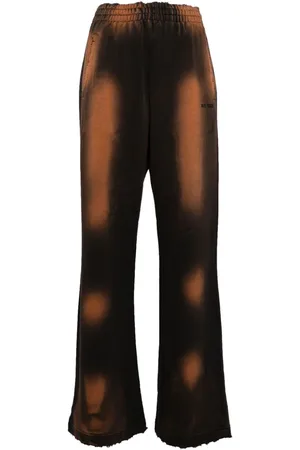 We11 Done Distressed track pants