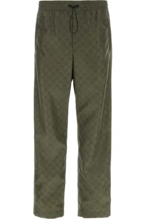 Gucci All-over logo-print trousers